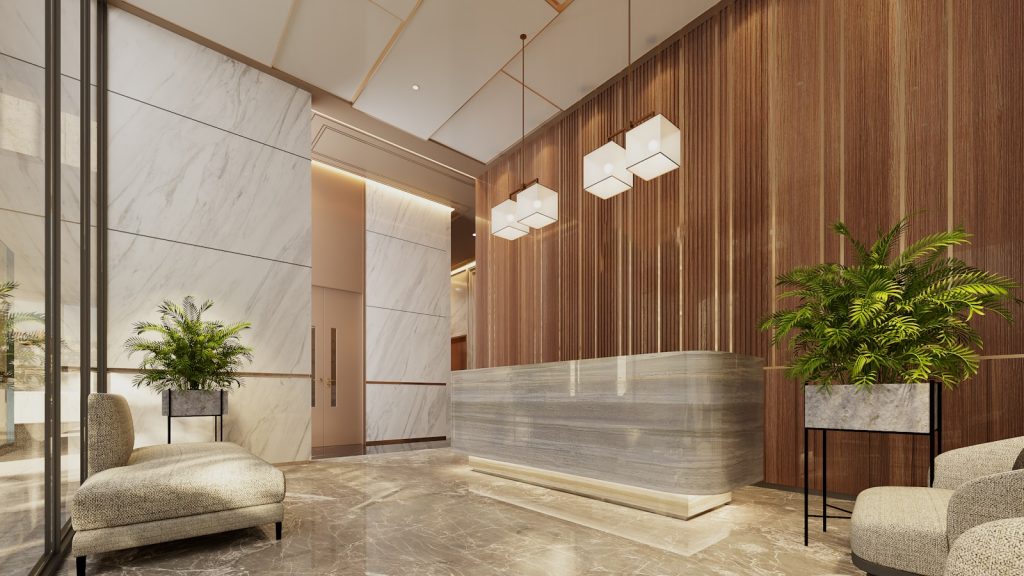 Modern lobby with marble reception desk and plants